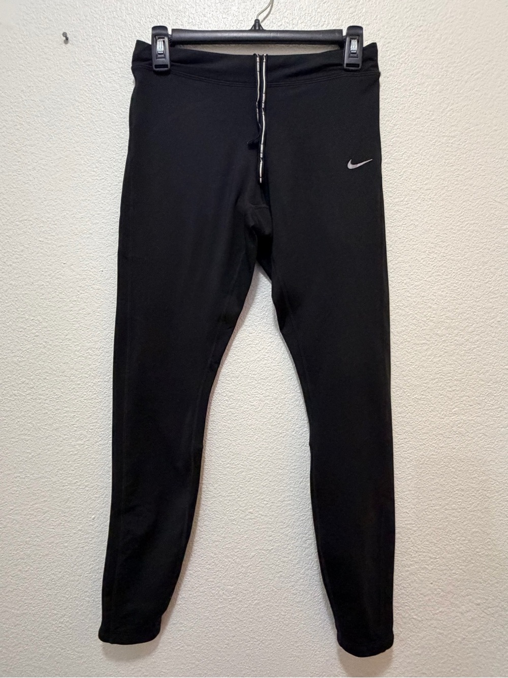 Nike Dri Fit compression tapered ankle length leggings, with zipper ankles